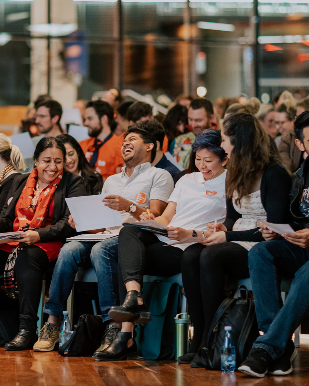 Audience laughing and engaged during one of my keynotes